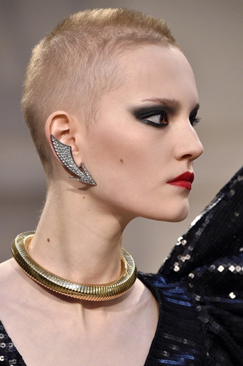 Ear cuffs at Saint Laurent (Credit: AFP Photo/ Martin Bureau)